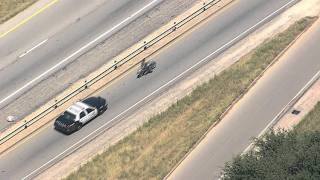 Policia siguiendo Harley